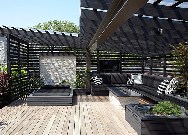 Rooftop deck with seating and a pergola